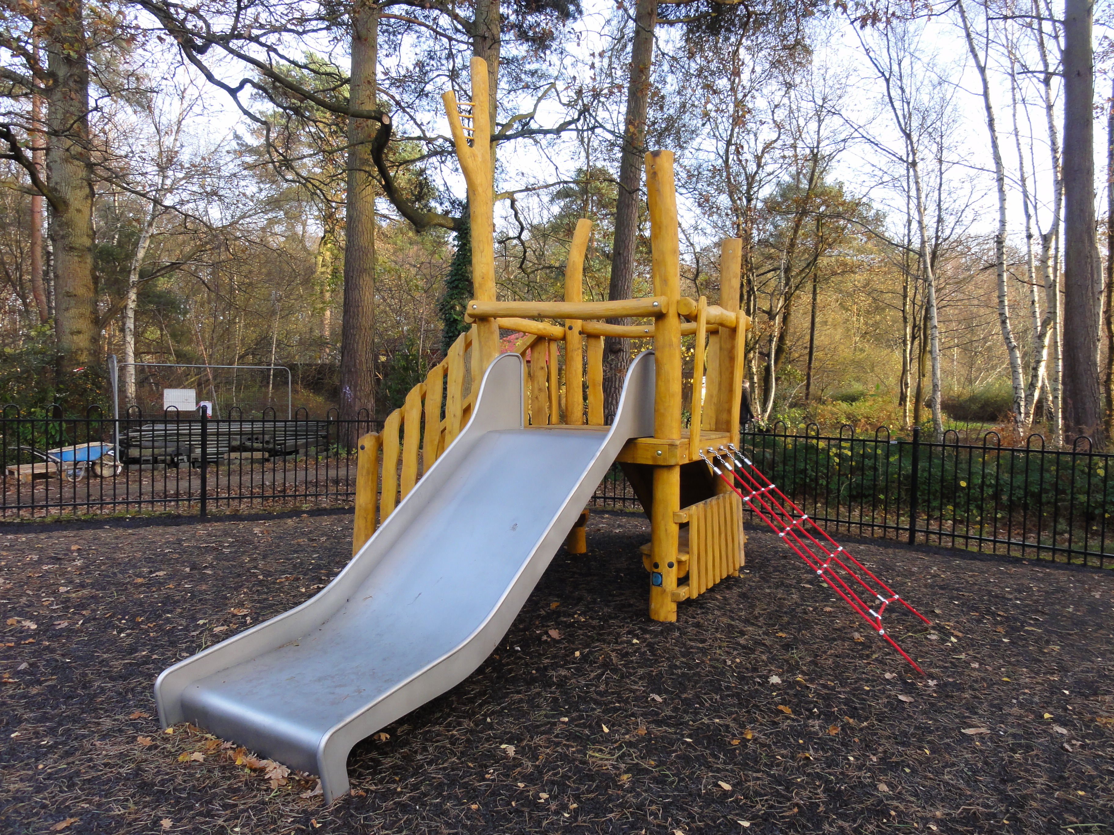 Playground Equipment, Junior Unit 5.103 Woodcote Green with wide slide ( 1.0 m) height 1.0 m, with stairs, net entrance and ramp with rope