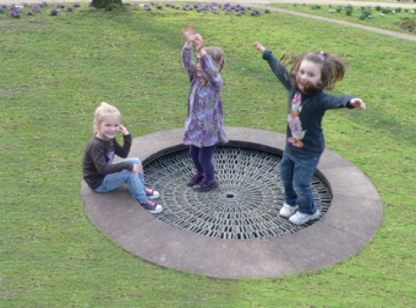 Children bouncing on a trampoline